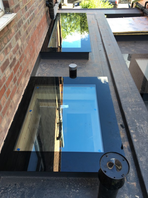Multiple flat roof skylights on extension in Notting Hill